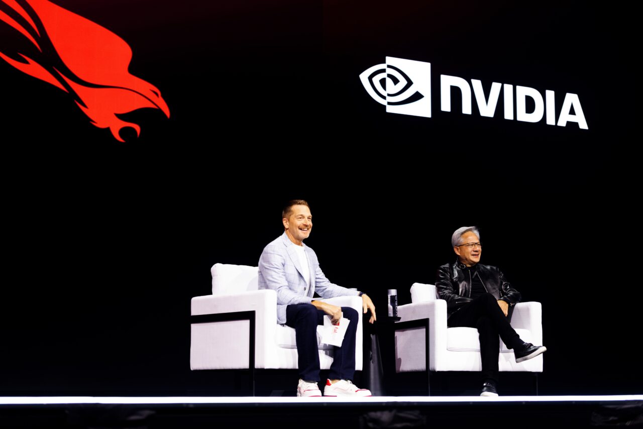 Jensen Huang and George Kurtz on stage at Fal.Con 2026